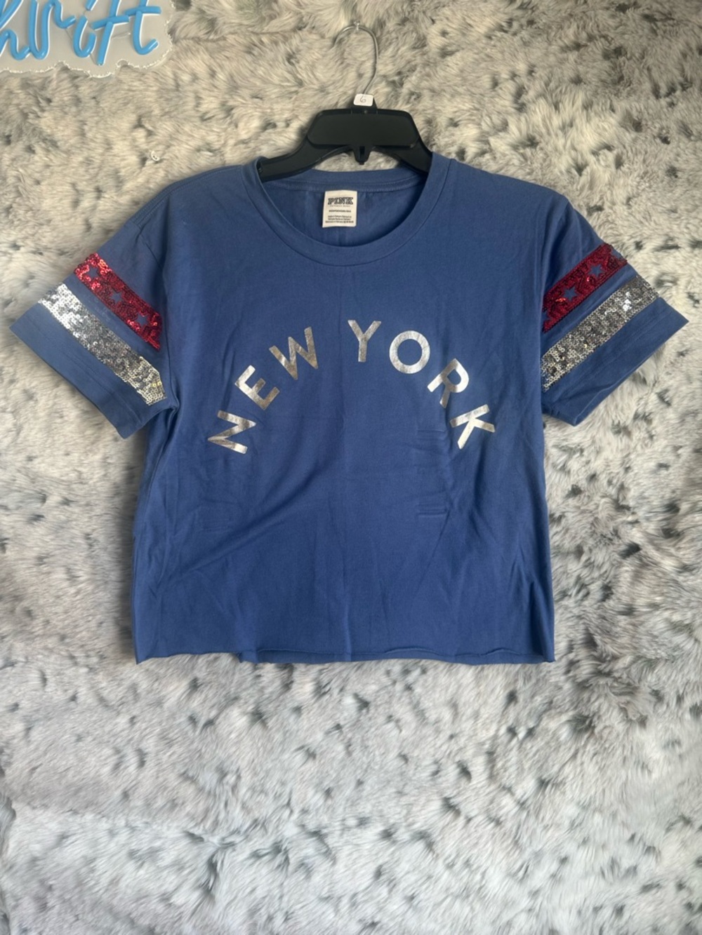 328. Victoria's Secret PINK blue New York graphic sequin sleeve